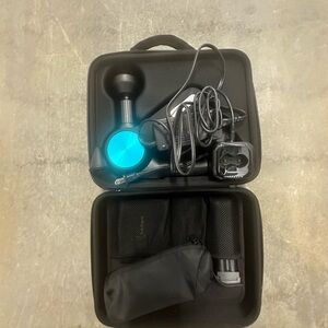 Massage device THERAGUN